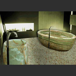 проект для ванной комнаты: умывальник-стойка из зеленого оникса и ванна из зеленого оникса.