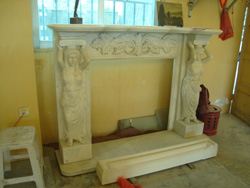 Fireplace from natural stone -  marble