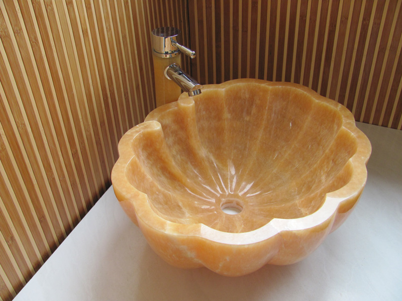 onyx sink in the shape of seashell