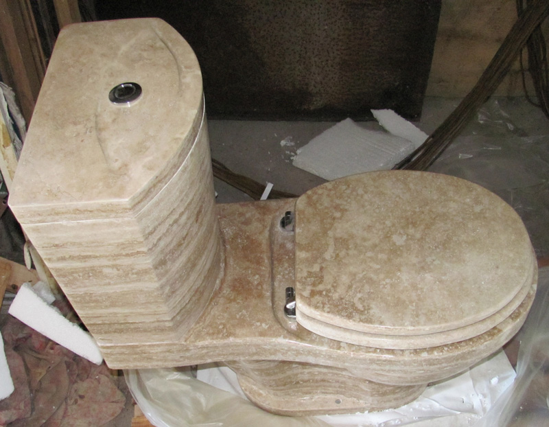 toilet made out of natural stone - travertine